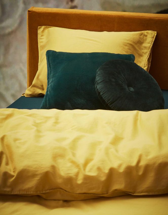 Sfeerfoto van het dekbedovertrek minte duvet cover golden yellow
